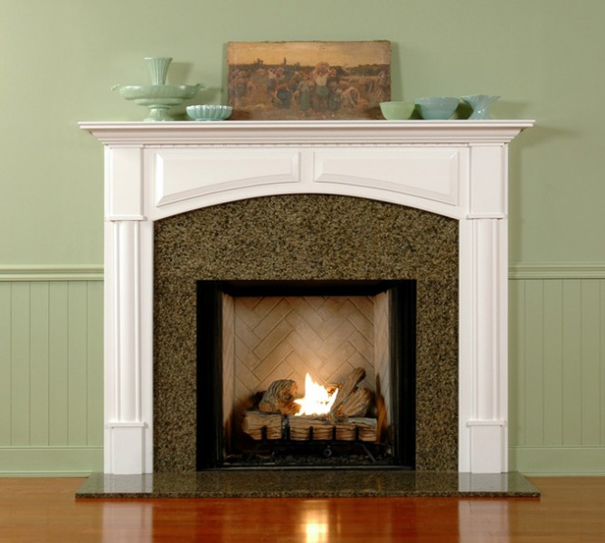 Arched breast and raised panels add elagance to the Lexington mantel surround.