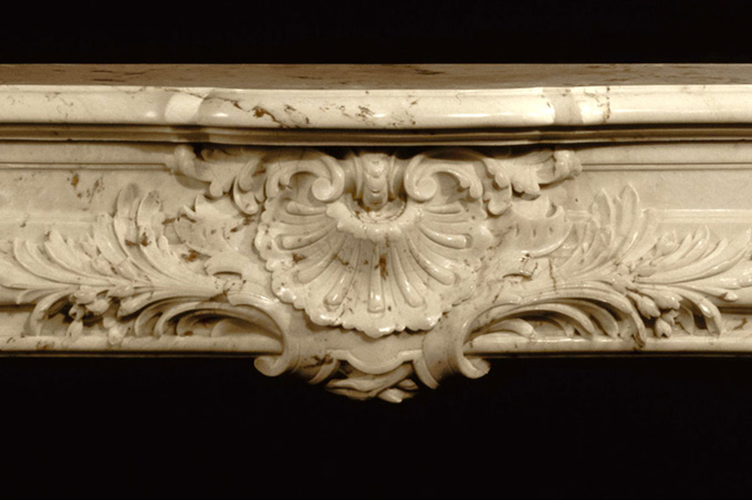 Center of the Fontaine marble mantel in ribera brown