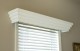 The Falls wood cornice shown in semi gloss white.