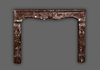 The Savoy reproduction Marble Mantel in Rouge Royal.