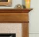 Detail image of the Monticello wood mantel.