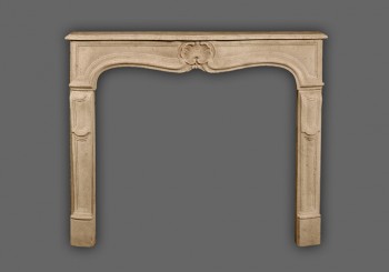 The Provence marble mantel has a beautiful shell design in the center