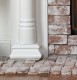 Decorative base for columns on the Georgian mantel.