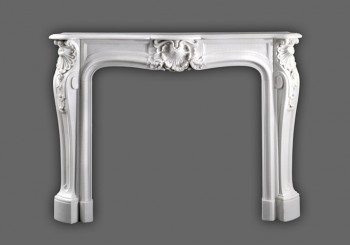 Beautiful French marble mantel has Louis XIV styling. Italian Bianco