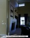 Cast Stone fireplace mantel. Custom Hearth shown.