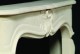 The arches in this Louis XV marble mantel are architecturally accurate