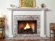 A detailed center piece adds that special touch to this fireplace.