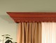The Corinthian cornice with dentil detail.