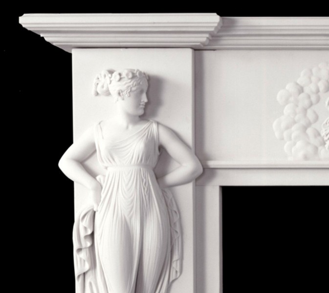 Not details left undone on this fine reproduction antique marble mantel with Italian design.
