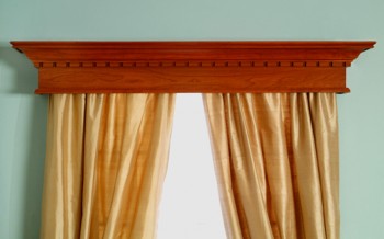 The Plymouth wood cornice with dentil.