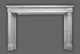 The Versailles Neoclassical style with beautifuly tapered legs on this marble mantel.