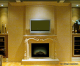 A Louis XV style stone mantel.