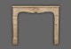 The Provence marble mantel has a beautiful shell design in the center