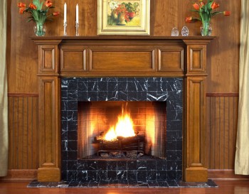 The quality shows with this cherry Oxford mantel surround.