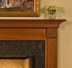 The Franciscan has fluted legs with crown molding under shelf.