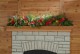 Detail image of shelf with holiday decorations.