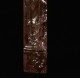 The legs of this Louis XV marble mantel are detailed