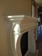 Detail image of the Crest thin cast stone mantel.