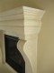 Detail image of the Regalia cast stone fireplace mantel.