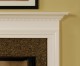 Mantel shown with sparkling pebble granite.