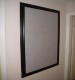 Black frame with grey granite bulletin board.