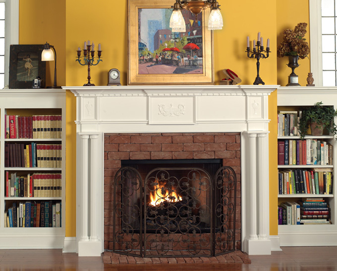 The Victoria mantel surround has column legs with latern appliques.
