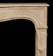 Proportioned spandrels are in position on this limestone mantel